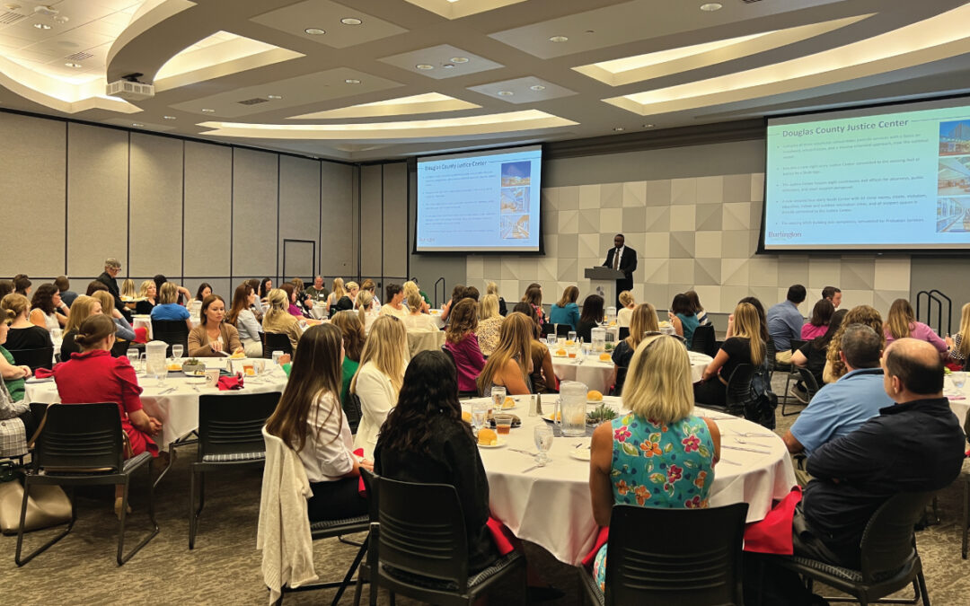 George Achola speaks at CREW Omaha September Luncheon